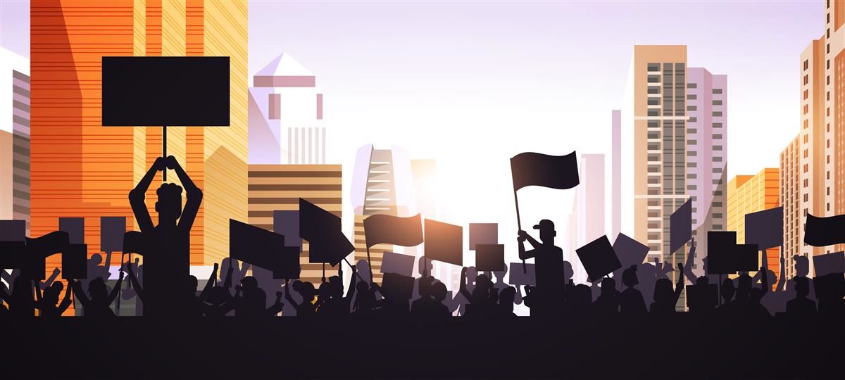 A crowd of activists in a city. A crowd of activists in a city.
